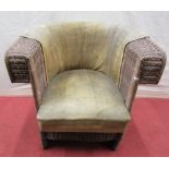 A good quality wicker tub chair with drop in upholstered seat and raised back rest