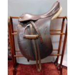 Good quality English dressage saddle by BP Swain, Walsall, 18 inch with serge covered underside