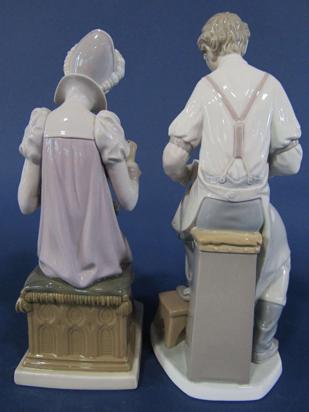 A Lladro Daisa figure of an alchemist, together with a Lladro Daisa figure of a woman with her - Image 2 of 3