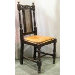 A set of five dark stained oak dining chairs, loosely in the Carolean style, with pierced and carved