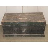 A vintage stained pine chest with hinged lid, containing a small quantity of carpentry related