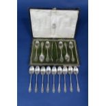 Cased suite of six silver spoons and sugar nips, all with fancy queens type pattern handles, maker
