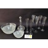 A mixed collection of modern glassware to include various champagne flutes and others, together with