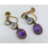 Pair of Edwardian 9ct amethyst and cabochon moonstone drop earrings with screw fastenings, 2.7cm