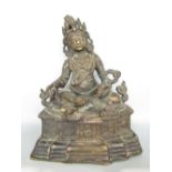 Interesting Eastern cast bronze seated Buddhistic deity, the character dressed in serpents and other