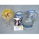 An early 19th century blue and white printed tankard in the oriental manner together with a