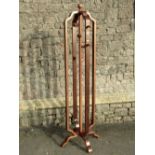 An Art Deco style moulded ply hat and coat stand on four shaped supports