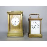 Large brass cased carriage clock, with gilt mask and circular enamel dial, 15cm high, together