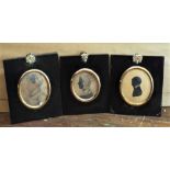 A collection of eight miniature silhouette portraits showing four ladies, three gentlemen and a
