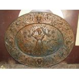 Art Nouveau bronzed cast iron plaque embossed with a maiden with her hands in the air, with floral