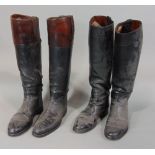 Two pairs of vintage black leather hunting boots, soles 30 cm max