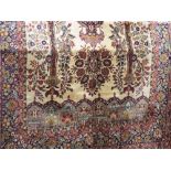 Good quality Indian carpet decorated with a central medallion and further Islamic foliage upon a