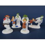 A collection of four Coalport snowmen figures The Gift, The Adventure Begins, The Hug, and Cowboy