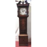 A Regency longcase clock, the oak case crossbanded in walnut, enclosing a 30cm square painted dial