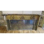 A Regency gilded overmantel mirror, enclosing three mirror plates, with spiral twist column supports