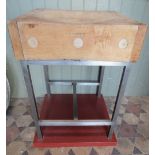 A well used maple butchers block (2ft square) raised on a stainless steel stand with H shaped