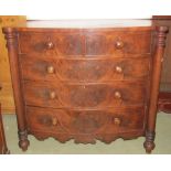 A Victorian mahogany bow fronted bedroom chest of two short over three graduated drawers with