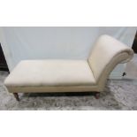 A contemporary Victorian style chaise/day bed with upholstered seat, scrolled head rest raised on