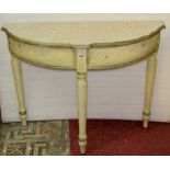 A good quality demi-lune side/hall table raised on three turned supports with painted stencilled