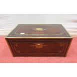A Regency rosewood and brass inlaid writing slope with fitted interior and flush fitting brass