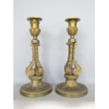Pair of good quality gilt cast metal candlesticks in the Louis Philippe manner, 21 cm high (2)
