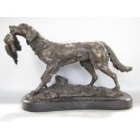 Cast bronze study of a working dog with a game bird in its mouth, upon a shaped marble base, 45 cm