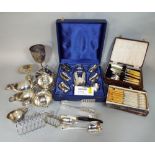A large collection of silver plated items to include a cased cocktail set with shaker and four