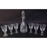 A good quality novelty decanter and glass set, all engraved with various songbirds amidst foliage,