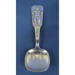 Norwegian white metal souvenir spoon, the handle cast with 'The Angry Baby' and Oslo with further