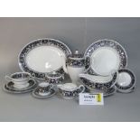 A quantity of Wedgwood Florentine pattern wares including oval meat plate, sauce boat and stand,