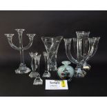 A mixed collection of glassware to include three - three branch candelabra, various other candle