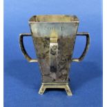 Interesting good quality Irish silver mether cup with four handles and upon four splayed feet,