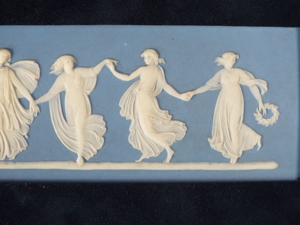 A pair of Wedgwood blue ground Jasperware plaques showing dancing classical female figures (in one - Image 6 of 7