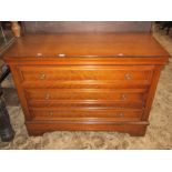 French cherry wood commode of three long drawers with moulded detail and bracket supports, 112cm