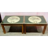 A pair of low occasional tables, the brass framed rectangular tops with inset printed maps and