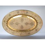 Good Eastern brass oval tray/platter pierced and embossed with fruiting vines, 80 x 53 cm together