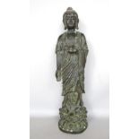 Eastern bronze figure of a standing Buddistic deity standing upon a lotus flower, 39 cm high