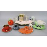 A collection of Carlton wares including a Walking ware cup, an Oak Tree pattern jug, a Jaffa