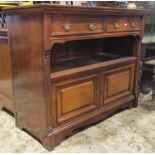 A late Victorian walnut sideboard, fitted with two frieze drawers, over an open fronted