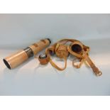 Leather clad draw telescope by Priory, together with a further cased lens (2)