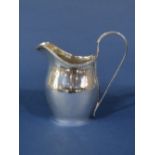 George III silver helmet cream jug, of baluster form, maker marks rubbed, London 1801, 12cm high,