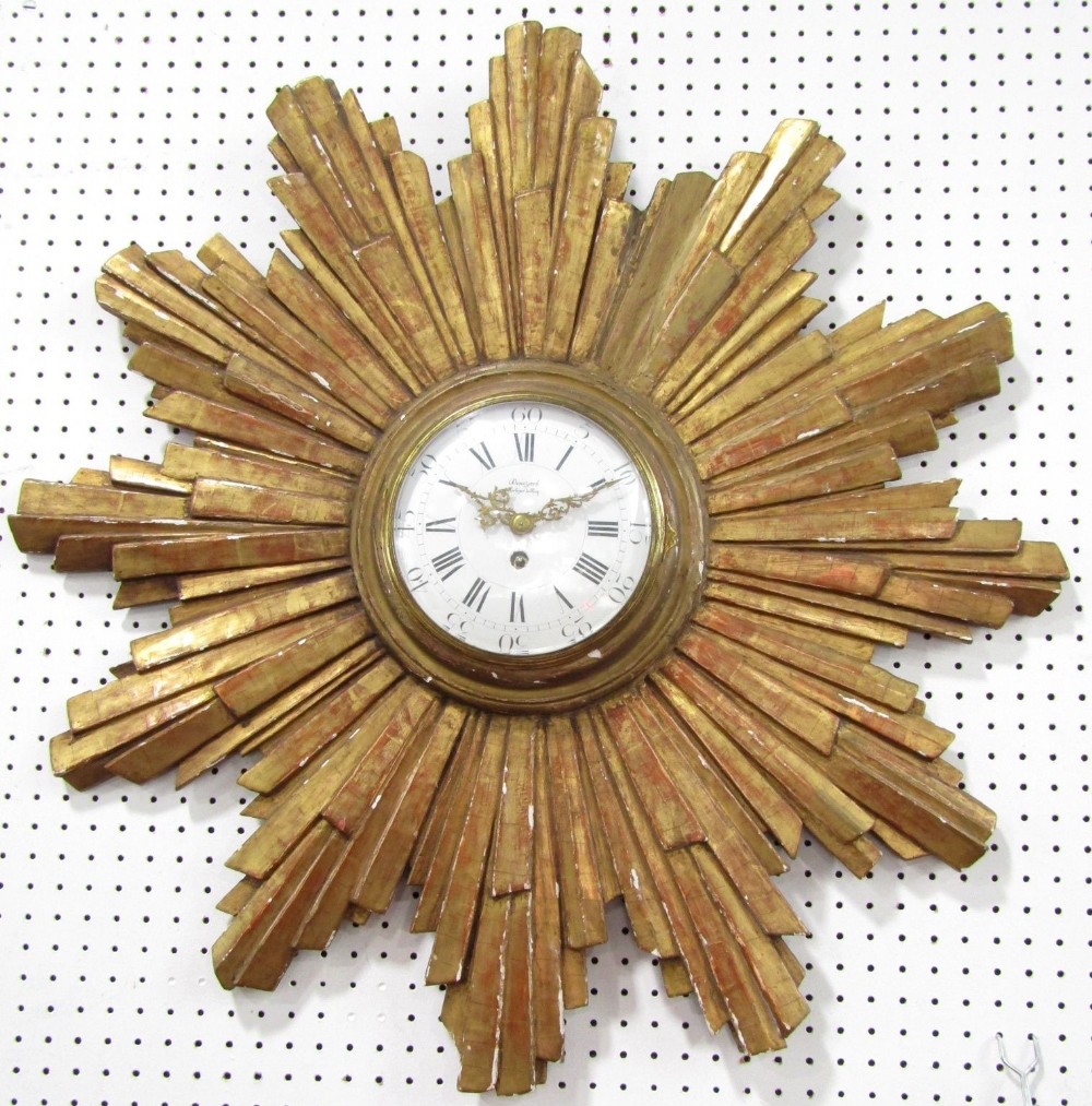 Good French carved gilt wood sunburst cartel type wall clock, with convex glass and enamel dial,
