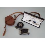 World War II military compass, T.G & cO 294862, 1944 Mark III in leather pouch, Parker Sonnet