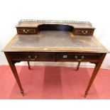 An Edwardian mahogany ladies writing desk - crossbanded in satinwood, fitted with two frieze drawers