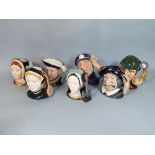 A collection of seven large Royal Doulton character jugs comprising Henry VIII, Catherine of Aragon,