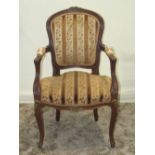 A French open armchair with showwood frame, moulded detail and upholstered seat and back raised on