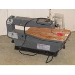 An 85w scroll saw, cutting depth 50 mm, maximum cutting width 40 mm with adjustable table