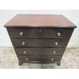 An early 20th century mahogany chest in the Georgian style of four long graduated drawers with brass