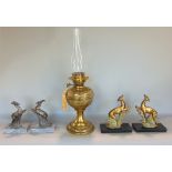 A mixed miscellaneous lot to include two pairs of prancing deer in the Art Deco manner, a further