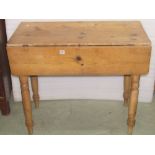 A pine Pembroke type table with frieze drawer raised on turned legs, together with a pair of hoop